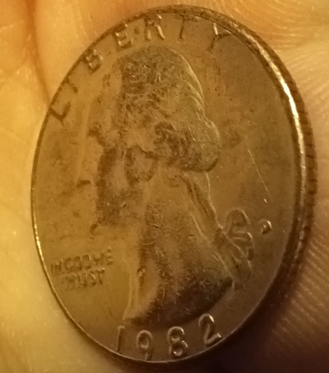1982-Quarter-With-Copper-Showing-Through-Face.-Cladding-Error?
